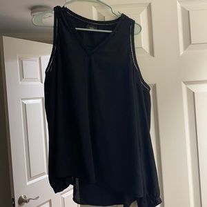 Thick-sleeve tank top formal shirt. Black with modest v-cut.